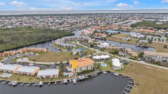 bird's eye view with a water view