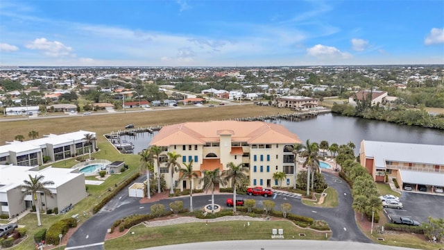 birds eye view of property featuring a water view