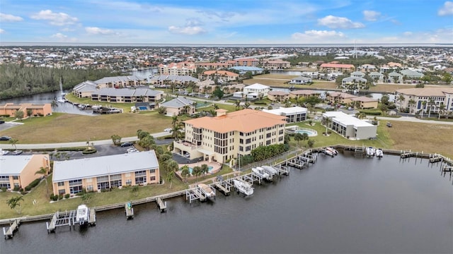 drone / aerial view featuring a water view