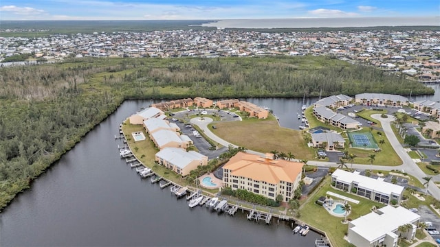 birds eye view of property featuring a water view