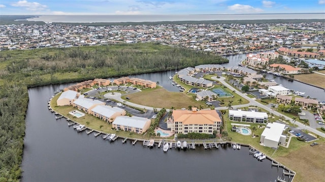 bird's eye view with a water view