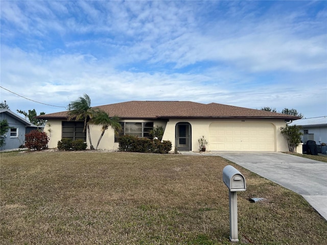 single story home featuring a garage and a front yard