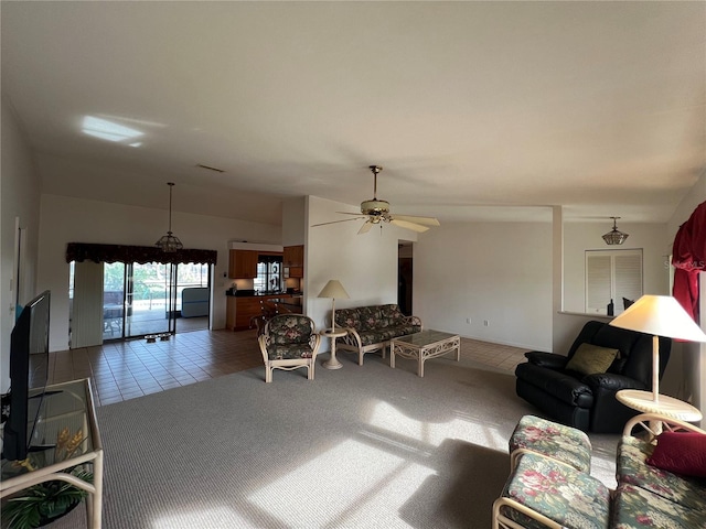 tiled living room with vaulted ceiling and ceiling fan