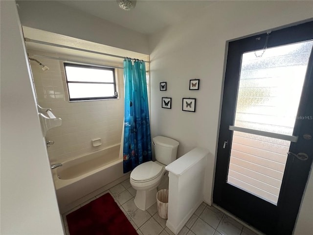 bathroom featuring tile patterned flooring, plenty of natural light, and shower / tub combo with curtain