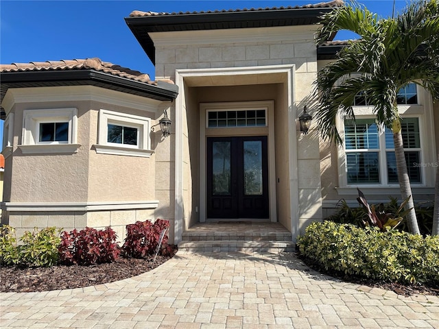 doorway to property featuring french doors