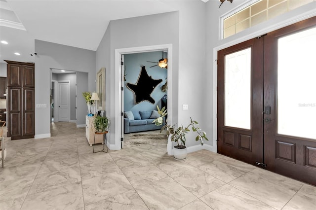 foyer entrance with french doors and crown molding