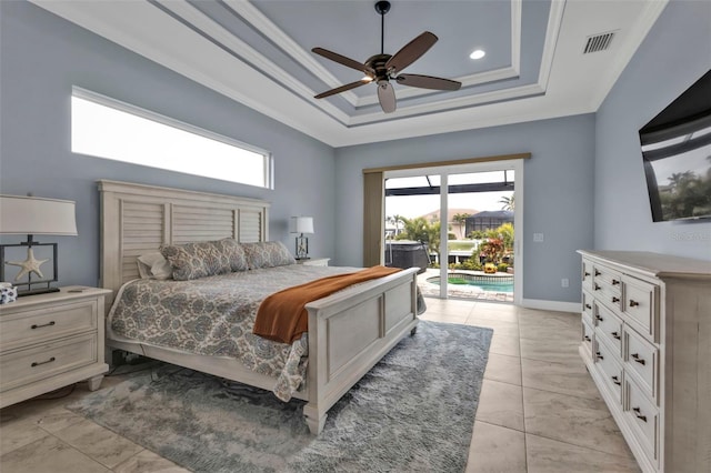 tiled bedroom featuring crown molding, ceiling fan, a raised ceiling, and access to outside