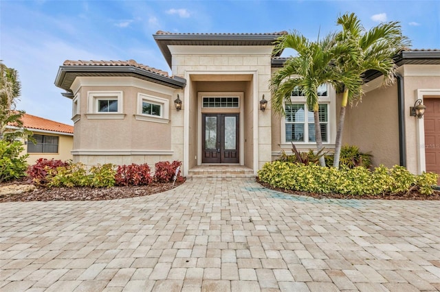 doorway to property featuring a garage