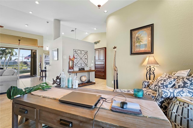 tiled living room featuring high vaulted ceiling