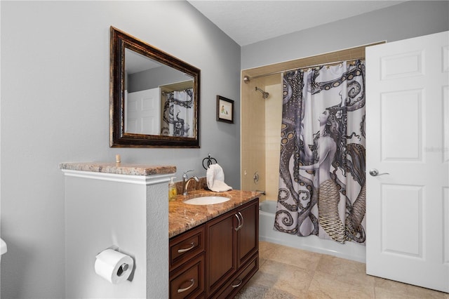 bathroom featuring vanity and shower / bath combination with curtain