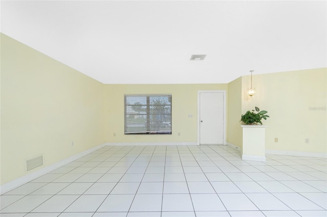 view of tiled spare room