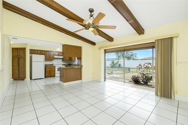 kitchen featuring ceiling fan, lofted ceiling with beams, sink, light tile patterned flooring, and white appliances