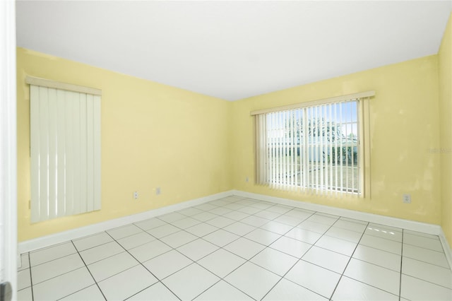 view of tiled spare room