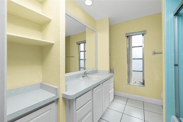 bathroom featuring walk in shower, vanity, toilet, and tile patterned flooring