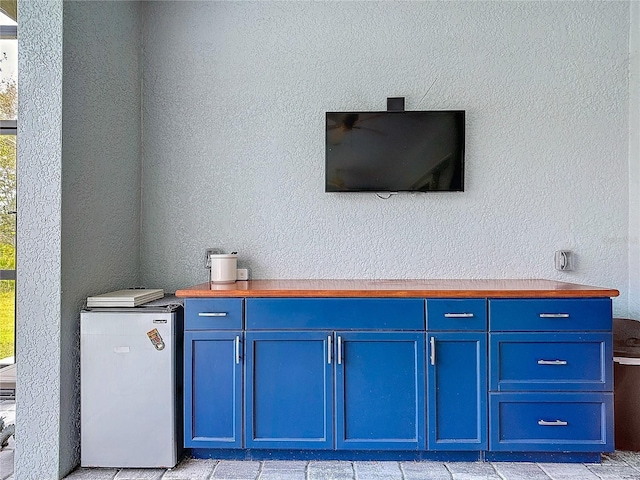 room details featuring refrigerator