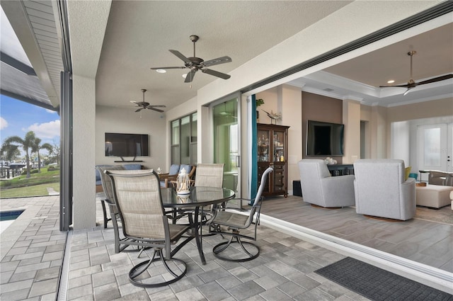 view of patio / terrace with ceiling fan and french doors