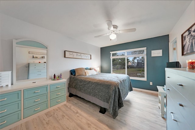 bedroom featuring ceiling fan and light wood-type flooring