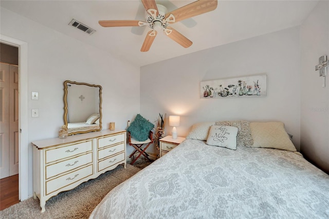 carpeted bedroom with ceiling fan