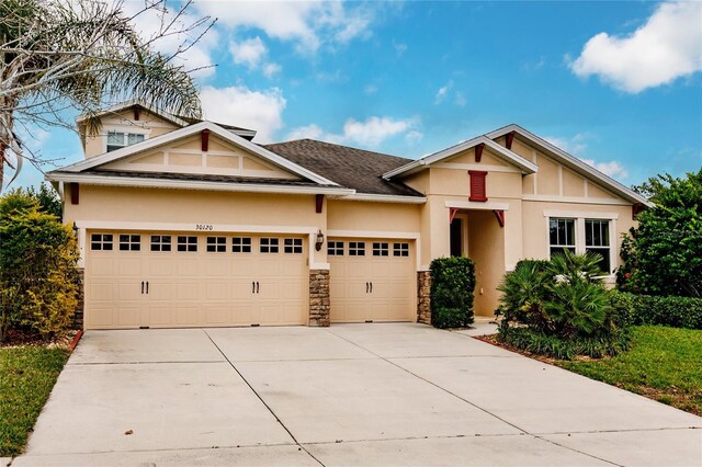 craftsman-style home featuring a garage