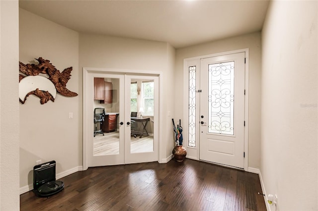 entryway with french doors and dark hardwood / wood-style flooring