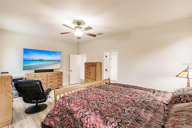 bedroom featuring light wood-type flooring and ceiling fan