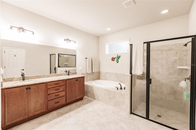 bathroom with separate shower and tub, tile patterned floors, and vanity