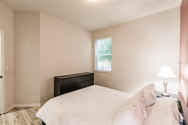 bedroom featuring light hardwood / wood-style floors