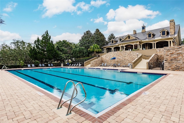 view of pool with a patio area