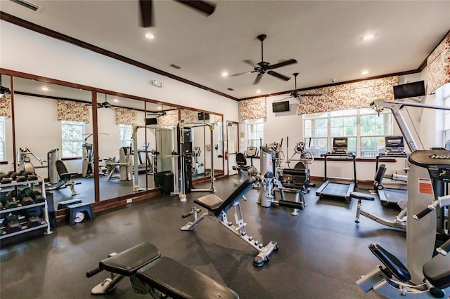 gym with ceiling fan and ornamental molding