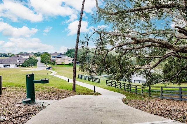 view of community featuring a yard