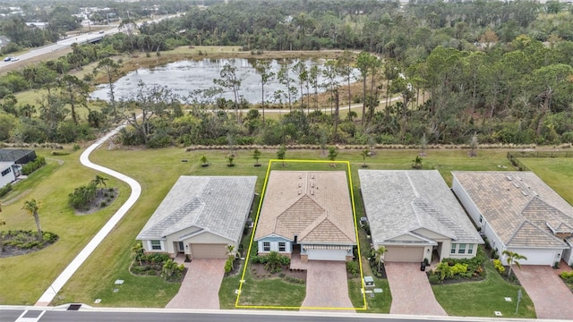 birds eye view of property featuring a water view