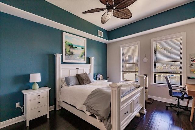 bedroom featuring dark hardwood / wood-style flooring and ceiling fan