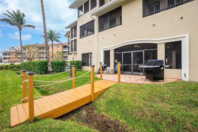 exterior space featuring a yard and a patio