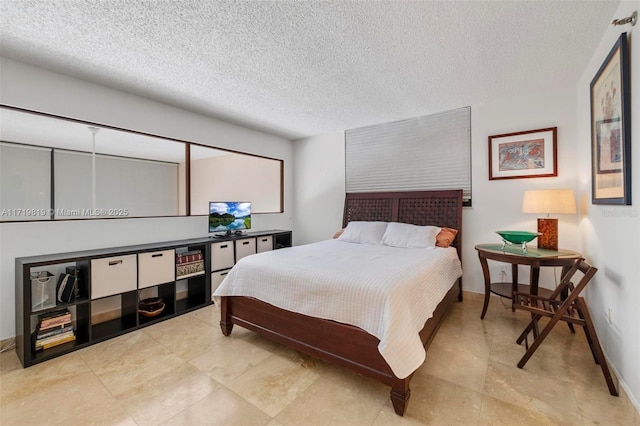 bedroom with a textured ceiling