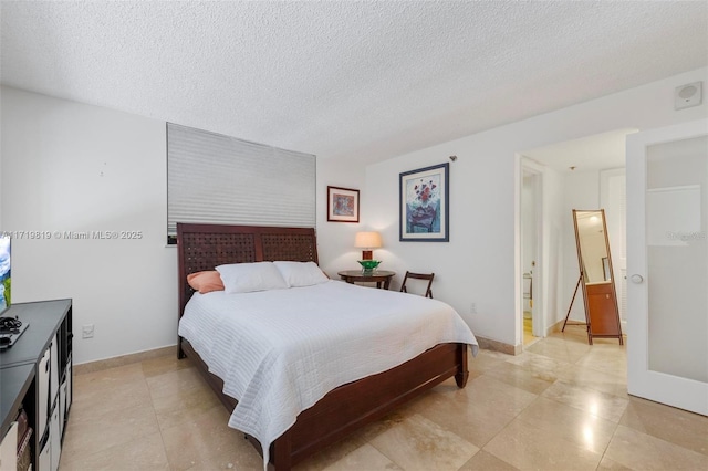 bedroom with a textured ceiling