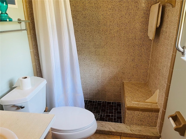 bathroom with toilet and curtained shower