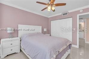 bedroom with ceiling fan and ornamental molding