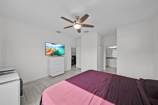 bedroom with connected bathroom and ceiling fan