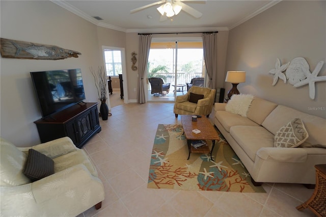 living room featuring light tile patterned floors, ceiling fan, and ornamental molding