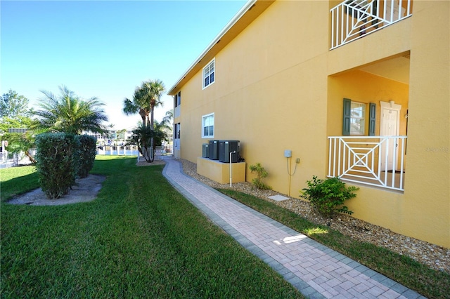 view of yard featuring central AC