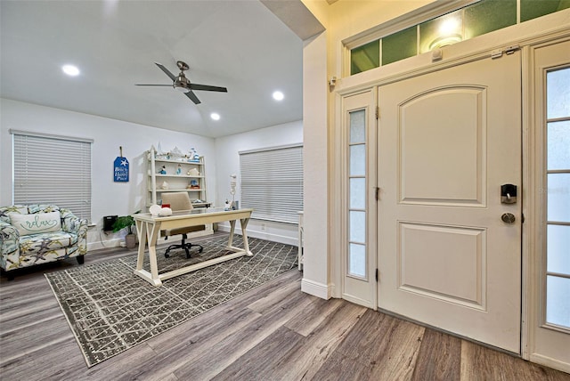 home office featuring ceiling fan, a healthy amount of sunlight, and hardwood / wood-style flooring