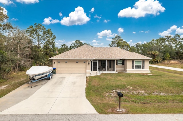 single story home with a front lawn and a garage