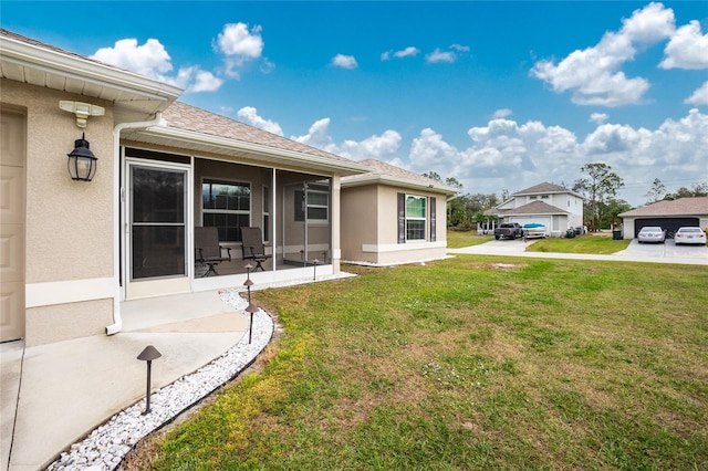 view of yard with a sunroom