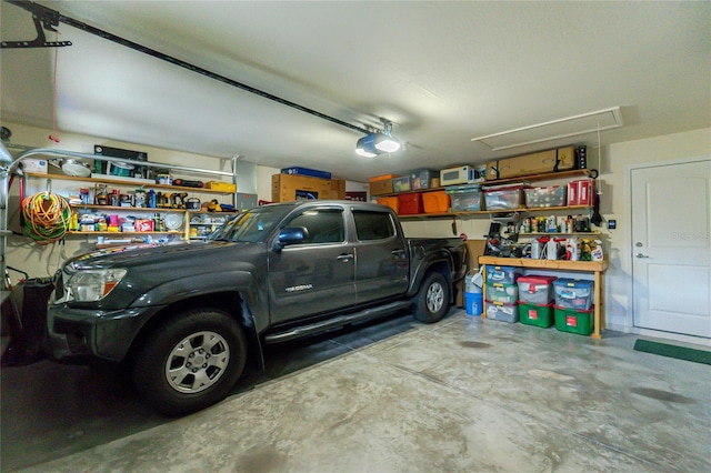 garage featuring a garage door opener