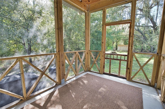 unfurnished sunroom with a healthy amount of sunlight