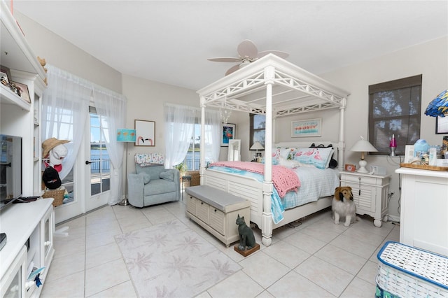 tiled bedroom featuring access to exterior and ceiling fan