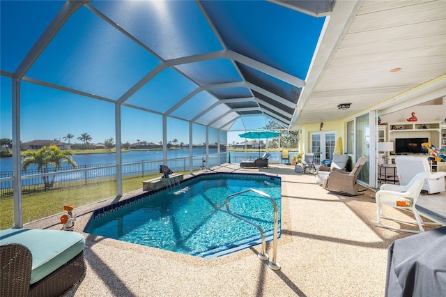 view of pool with french doors, a lanai, pool water feature, a water view, and a patio area