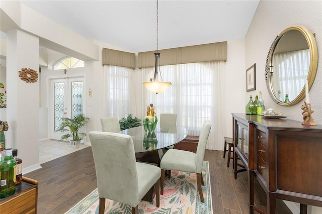 24337 Contra Costa Ln, Punta Gorda, FL 33955 - dining area with dark wood-type flooring and plenty of natural light
