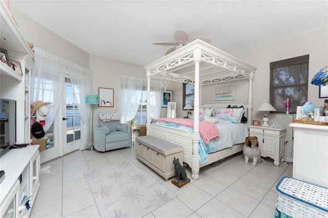 24337 Contra Costa Ln, Punta Gorda, FL 33955 - bedroom with access to outside, light tile patterned floors, and a ceiling fan