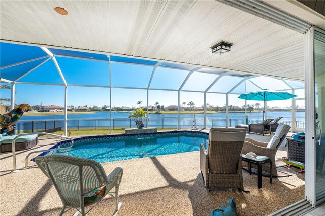 24337 Contra Costa Ln, Punta Gorda, FL 33955 - swimming pool featuring a patio area, a water view, and a lanai